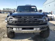 ✅ 2023 Ford Bronco Raptor • VIN: 1FMEE5JR1PLC05977 • Lot: 45734925. Listed on Copart with 10,001 mi. Free auction sales archive from the USA and detailed vehicle history report at DreamBid. Image 5.