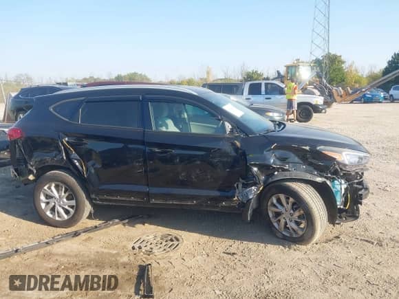 2019 Hyundai Tucson Value with VIN KM8J33A48KU925616, listed as a IAAI auction lot 43364206 with 71,119 mi miles and . Bid and sale history available at DreamBid. Image 14.