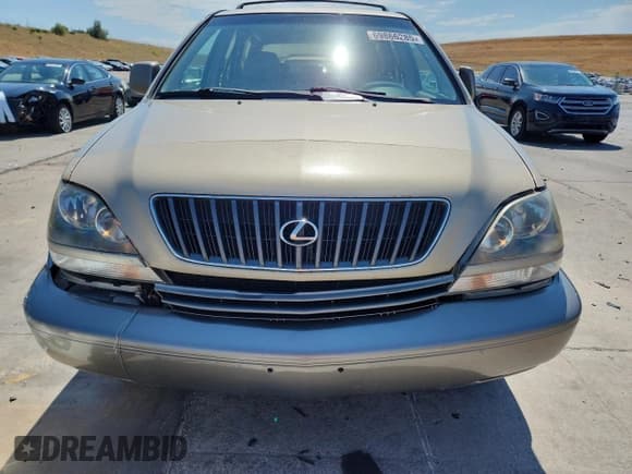 ✅ 1999 Lexus RX 300 • VIN: JT6HF10U4X0051562 • Lot: 69866285. Listed on Copart with 216,792 mi. Free auction sales archive from the USA and detailed vehicle history report at DreamBid. Image 5.