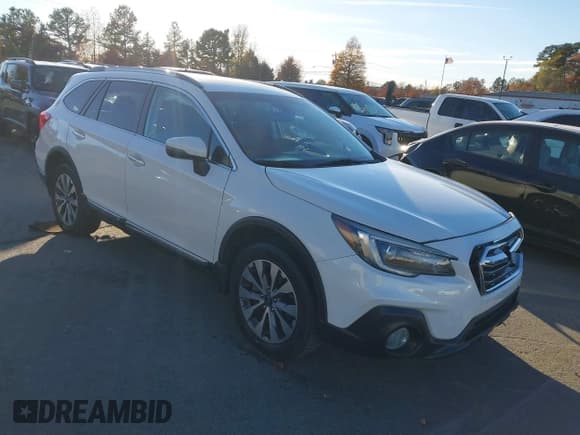 ✅ 2018 Subaru Outback Touring • VIN: 4S4BSATC5J3352775 • Lot: 43673950. Listed on IAAI with 84,097 mi. Free auction sales archive from the USA and detailed vehicle history report at DreamBid. Image 1.
