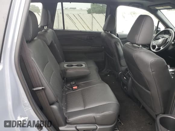 ✅ 2023 Honda Passport Elite • VIN: 5FNYF8H04PB003015 • Лот: 68722765. Опубликован ранее на Copart с пробегом 33 887 миль. Бесплатный доступ к архиву аукционных продаж из США и подробный отчёт об истории автомобиля на DreamBid. Изображение 11.