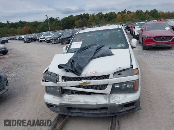 2012 Chevrolet Colorado Work Truck with VIN 1GCESBF99C8161891, listed as a IAAI auction lot 43005636 with 144,193 mi miles and . Bid and sale history available at DreamBid. Image 12.