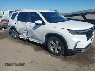 ✅ 2025 Honda Pilot EX-L • VIN: 5FNYG1H40SB147757 • Лот: 43590677. Опубликован ранее на IAAI с пробегом 6 292 миль. Бесплатный доступ к архиву аукционных продаж из США и подробный отчёт об истории автомобиля на DreamBid. Изображение 1.