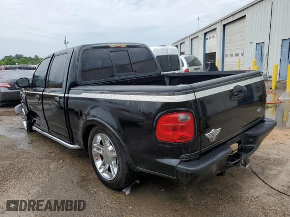 ✅ 2003 Ford F-150 Harley-Davidson • VIN: 1FTRW07333KD41438 • Lot: 54342755. Listed on Copart with 216,391 mi. Free auction sales archive from the USA and detailed vehicle history report at DreamBid. Image 2.