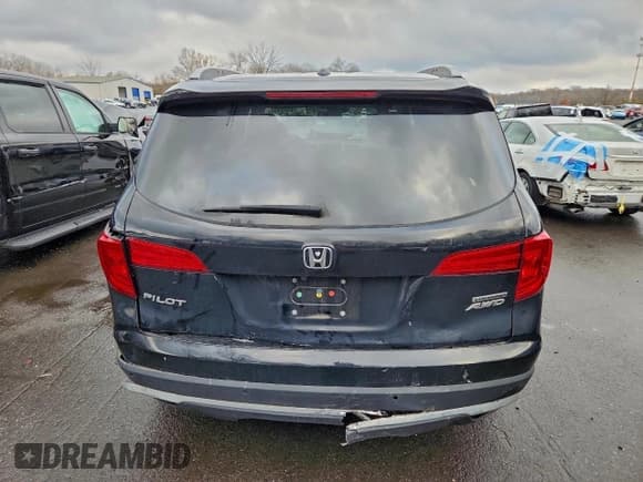 ✅ 2017 Honda Pilot Touring • VIN: 5FNYF6H94HB022653 • Lot: 94408435. Listed on Copart with 74,411 mi. Free auction sales archive from the USA and detailed vehicle history report at DreamBid. Image 6.