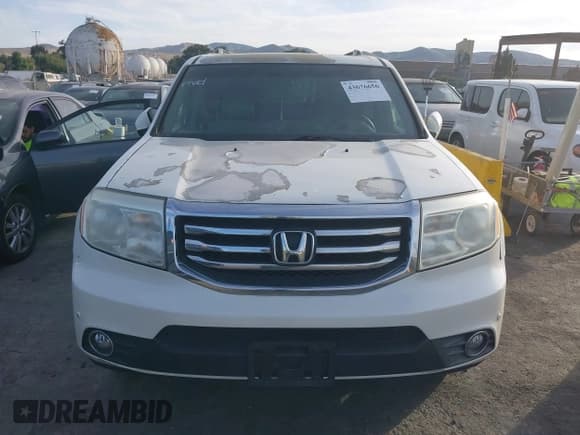 ✅ 2012 Honda Pilot Touring • VIN: 5FNYF3H91CB033147 • Lot: 43676656. Listed on IAAI with 282,360 mi. Free auction sales archive from the USA and detailed vehicle history report at DreamBid. Image 12.