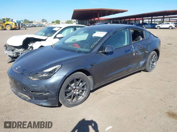 ✅ 2021 Tesla Model 3 Standard Range Plus • VIN: 5YJ3E1EAXMF048666 • Lot: 42155267. Wystawiony na IAAI z przebiegiem Nie podano. Bezpłatny archiwum sprzedaży aukcyjnych z USA i szczegółowy raport historii pojazdu na DreamBid. Zdjęcie 2.