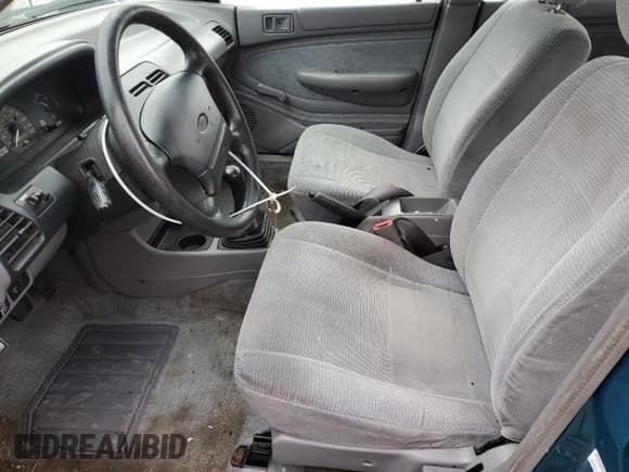 ✅ 1994 Ford Escort • VIN: 1FARP15J3RW125262 • Lot: 37350764. Wystawiony na Copart z przebiegiem 666 789 mil. Bezpłatny archiwum sprzedaży aukcyjnych z USA i szczegółowy raport historii pojazdu na DreamBid. Zdjęcie 7.