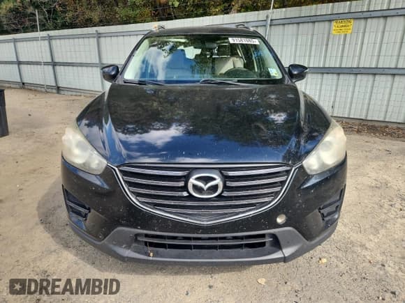 ✅ 2016 Mazda CX-5 Sport • VIN: JM3KE2BY4G0702168 • Лот: 91581085. Опубликован ранее на Copart с пробегом 318 805 миль. Бесплатный доступ к архиву аукционных продаж из США и подробный отчёт об истории автомобиля на DreamBid. Изображение 5.