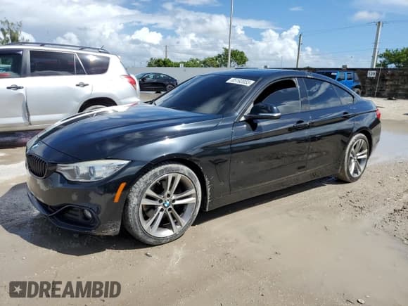 ✅ 2015 BMW 4 Series 428i • VIN: WBA4A5C51FG051989 • Lot: 85192055. Listed on Copart with 62,934 mi. Free auction sales archive from the USA and detailed vehicle history report at DreamBid. Image 1.