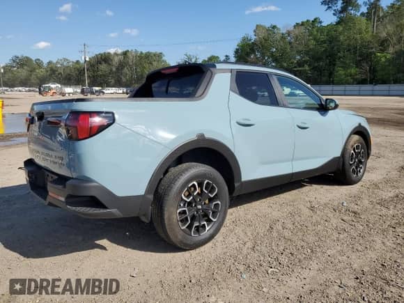 2023 Hyundai Santa Cruz SEL Premium z VIN 5NTJDDAF0PH061883, wystawiony jako Copart lot #50525124 z przebiegiem 12 652 mil mil oraz Szkoda całkowita • Salvage title. Historia ofert i sprzedaży dostępna na DreamBid. Obrazek 3.