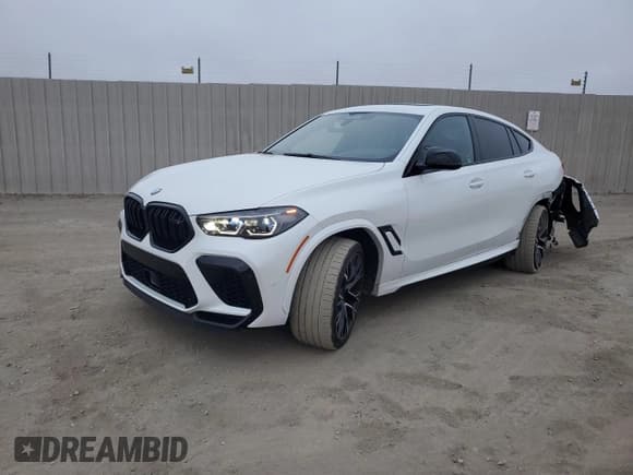 ✅ 2022 BMW X6 M • VIN: 5YMCY0C08N9L71063 • Lot: 69305505. Wystawiony na Copart z przebiegiem 21 102 mil. Bezpłatny archiwum sprzedaży aukcyjnych z USA i szczegółowy raport historii pojazdu na DreamBid. Zdjęcie 1.