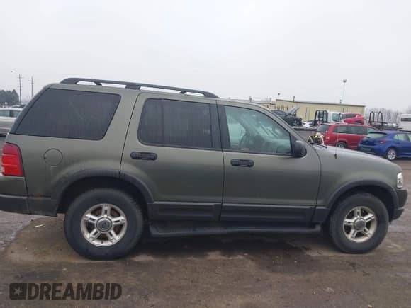 ✅ 2003 Ford Explorer XLT • VIN: 1FMZU73E13UA81241 • Lot: 41132219. Listed on IAAI with 299,709 mi. Free auction sales archive from the USA and detailed vehicle history report at DreamBid. Image 14.