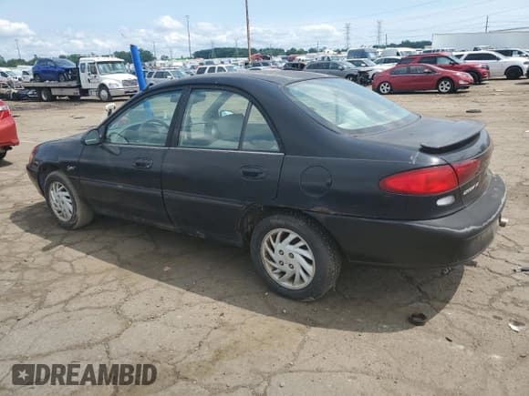 ✅ 1998 Ford Escort SE • VIN: 1FAFP13P9WW174004 • Lot: 65843664. Wystawiony na Copart z przebiegiem 101 507 mil. Bezpłatny archiwum sprzedaży aukcyjnych z USA i szczegółowy raport historii pojazdu na DreamBid. Zdjęcie 2.