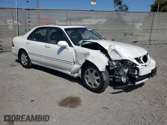 ✅ 2002 Acura RL • VIN: JH4KA96522C011028 • Lot: 61027505. Listed on Copart with 104,094 mi. Free auction sales archive from the USA and detailed vehicle history report at DreamBid. Image 4.
