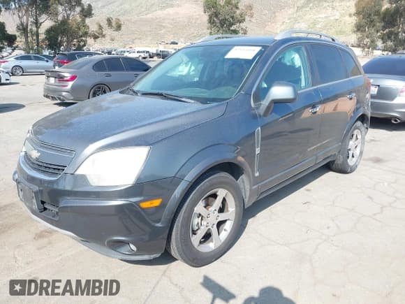 ✅ 2013 Chevrolet Captiva Sport LT • VIN: 3GNAL3EK4DS581063 • Lot: 42111098. Wystawiony na IAAI z przebiegiem 178 301 mil. Bezpłatny archiwum sprzedaży aukcyjnych z USA i szczegółowy raport historii pojazdu na DreamBid. Zdjęcie 2.