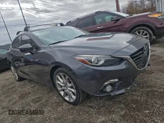 ✅ 2014 Mazda 3 S Grand Touring • VIN: JM1BM1M36E1194882 • Lot: 94943675. Listed on Copart with 189,663 mi. Free auction sales archive from the USA and detailed vehicle history report at DreamBid. Image 1.