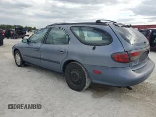 ✅ 1999 Ford Taurus SE • VIN: 1FAFP58U6XG294960 • Лот: 81061404. Опубликован ранее на Copart с пробегом 143 199 миль. Бесплатный доступ к архиву аукционных продаж из США и подробный отчёт об истории автомобиля на DreamBid. Изображение 2.