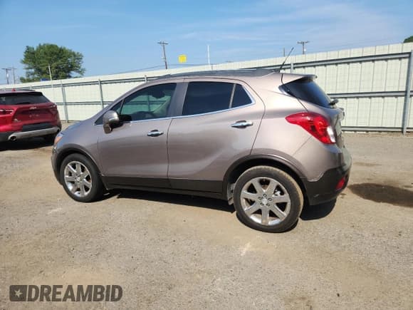 ✅ 2014 Buick Encore Premium • VIN: KL4CJDSB7EB712866 • Лот: 80203515. Опубликован ранее на Copart с пробегом 62 664 миль. Бесплатный доступ к архиву аукционных продаж из США и подробный отчёт об истории автомобиля на DreamBid. Изображение 2.