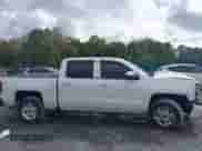 2017 Chevrolet Silverado 1500 LT with VIN 3GCUKREC8HG226281, listed as a IAAI auction lot 40446531 with 117,634 mi miles and . Bid and sale history available at DreamBid. Image 13.