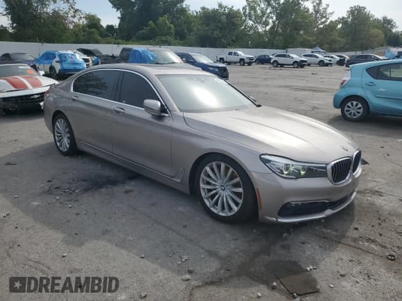✅ 2017 BMW 7 Series 740i • VIN: WBA7E2C3XHG741287 • Lot: 81467345. Listed on Copart with 112,218 mi. Free auction sales archive from the USA and detailed vehicle history report at DreamBid. Image 4.