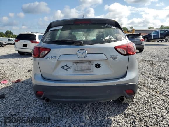 ✅ 2016 Mazda CX-5 Sport • VIN: JM3KE2BE5G0625784 • Lot: 64513945. Listed on Copart with 128,711 mi. Free auction sales archive from the USA and detailed vehicle history report at DreamBid. Image 6.