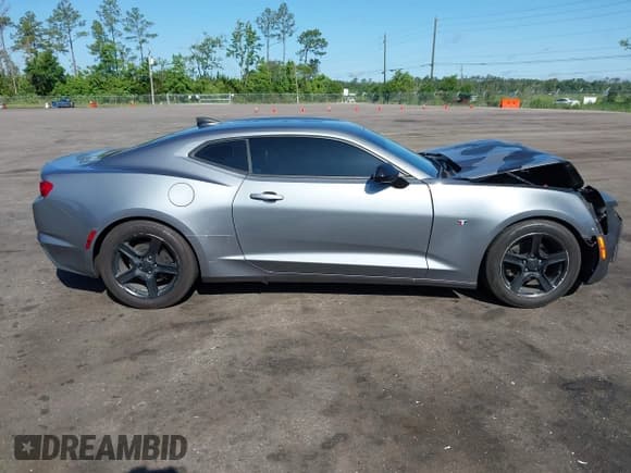 ✅ 2021 Chevrolet Camaro 1LT • VIN: 1G1FB1RS6M0136517 • Лот: 42302558. Опубликован ранее на IAAI с пробегом 95 803 миль. Бесплатный доступ к архиву аукционных продаж из США и подробный отчёт об истории автомобиля на DreamBid. Изображение 14.