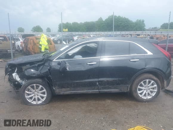 ✅ 2023 Cadillac XT4 AWD Luxury • VIN: 1GYFZBR40PF200976 • Lot: 39503922. Listed on IAAI with 9,403 mi. Free auction sales archive from the USA and detailed vehicle history report at DreamBid. Image 13.