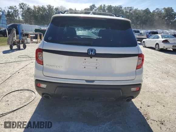 ✅ 2019 Honda Passport EX-L • VIN: 5FNYF7H50KB004838 • Lot: 92170845. Listed on Copart with 76,071 mi. Free auction sales archive from the USA and detailed vehicle history report at DreamBid. Image 6.