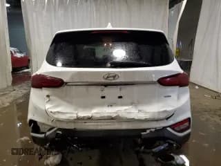 ✅ 2019 Hyundai Santa Fe SEL • VIN: 5NMS3CAD7KH075431 • Лот: 38396063. Опубликован ранее на Copart с пробегом 48 513 миль. Бесплатный доступ к архиву аукционных продаж из США и подробный отчёт об истории автомобиля на DreamBid. Изображение 6.