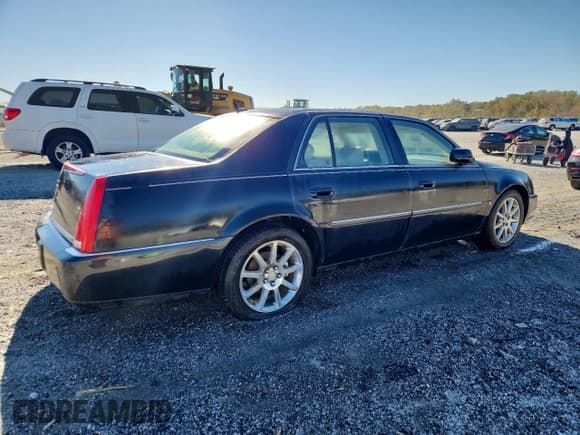 ✅ 2006 Cadillac DTS 1SE • VIN: 1G6KD57936U119082 • Lot: 86590315. Listed on Copart with 180,669 mi. Free auction sales archive from the USA and detailed vehicle history report at DreamBid. Image 3.