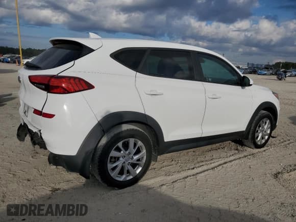 ✅ 2019 Hyundai Tucson SE • VIN: KM8J23A49KU971488 • Лот: 91629145. Опубликован ранее на Copart с пробегом 143 141 миль. Бесплатный доступ к архиву аукционных продаж из США и подробный отчёт об истории автомобиля на DreamBid. Изображение 3.