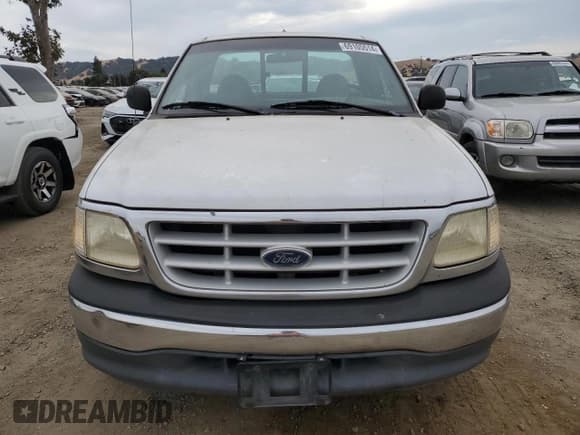 ✅ 1999 Ford F-150 XL • VIN: 1FTRF17L3XKA66147 • Lot: 69105514. Wystawiony na Copart z przebiegiem 179 426 mil. Bezpłatny archiwum sprzedaży aukcyjnych z USA i szczegółowy raport historii pojazdu na DreamBid. Zdjęcie 5.