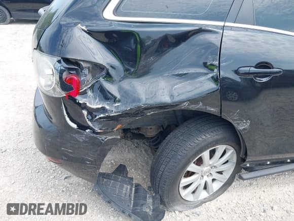 ✅ 2012 Mazda CX-7 i SV • VIN: JM3ER2A57C0415278 • Lot: 42488741. Listed on IAAI with 124,883 mi. Free auction sales archive from the USA and detailed vehicle history report at DreamBid. Image 6.