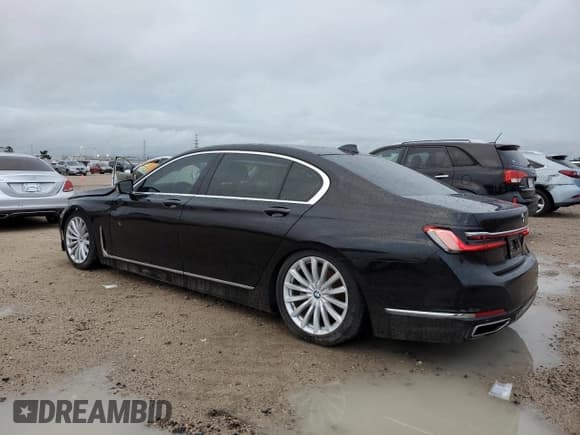 ✅ 2020 BMW 7 Series 740i • VIN: WBA7T2C07LGL17103 • Лот: 54065375. Опубликован ранее на Copart с пробегом 53 598 миль. Бесплатный доступ к архиву аукционных продаж из США и подробный отчёт об истории автомобиля на DreamBid. Изображение 2.