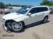 ✅ 2015 Mercedes-Benz GL 550 • VIN: 4JGDF7DE8FA548342 • Лот: 42573049. Опубликован ранее на IAAI с пробегом 103 456 миль. Бесплатный доступ к архиву аукционных продаж из США и подробный отчёт об истории автомобиля на DreamBid. Изображение 2.