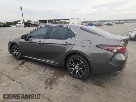 ✅ 2023 Toyota Camry SE • VIN: 4T1T11AK3PU802895 • Лот: 82749565. Опубликован ранее на Copart с пробегом 7 815 миль. Бесплатный доступ к архиву аукционных продаж из США и подробный отчёт об истории автомобиля на DreamBid. Изображение 2.
