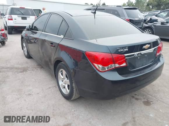 2014 Chevrolet Cruze 1LT with VIN 1G1PC5SB0E7242148, listed as a IAAI auction lot 43401415 with 206,878 mi miles and . Bid and sale history available at DreamBid. Image 3.