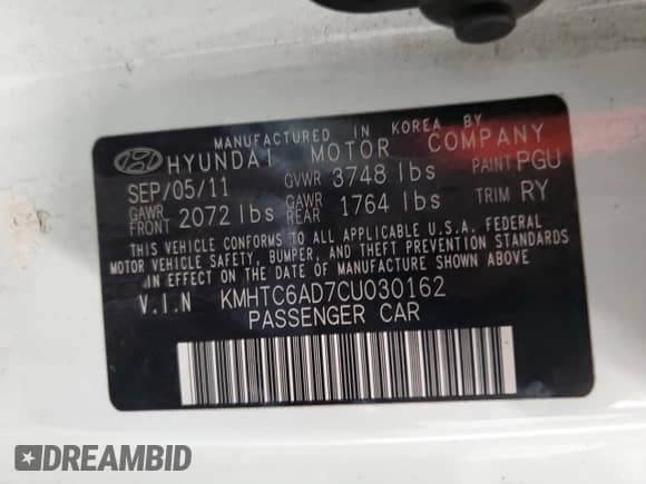 2012 Hyundai Veloster w/Red Int z VIN KMHTC6AD7CU030162, wystawiony jako Copart lot #73692164 z przebiegiem 101 371 mil mil oraz Szkoda całkowita • Salvage title. Historia ofert i sprzedaży dostępna na DreamBid. Obrazek 13.