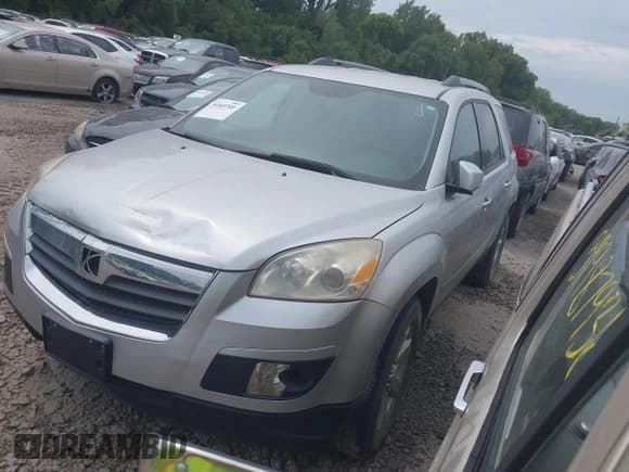 ✅ 2010 Saturn Outlook XE • VIN: 5GZLRTEDXAJ210535 • Лот: 39369705. Опубликован ранее на IAAI с пробегом 199 117 миль. Бесплатный доступ к архиву аукционных продаж из США и подробный отчёт об истории автомобиля на DreamBid. Изображение 2.