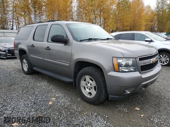 2007 Chevrolet Suburban LT z VIN 1GNFK16367J264668, wystawiony jako Copart lot #91350005 z przebiegiem 143 693 mil mil oraz Czysty tytuł • Clean title. Historia ofert i sprzedaży dostępna na DreamBid. Obrazek 4.