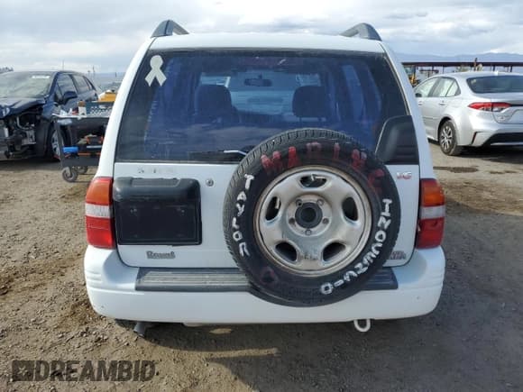 ✅ 2000 Suzuki Grand Vitara • VIN: JS3TE62V2Y4107535 • Lot: 56255115. Listed on Copart with Not provided. Free auction sales archive from the USA and detailed vehicle history report at DreamBid. Image 6.