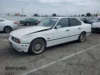 ✅ 1995 BMW 5 Series 525i • VIN: WBAHD6323SGK58981 • Lot: 59543195. Listed on Copart with 126,853 mi. Free auction sales archive from the USA and detailed vehicle history report at DreamBid. Image 1.