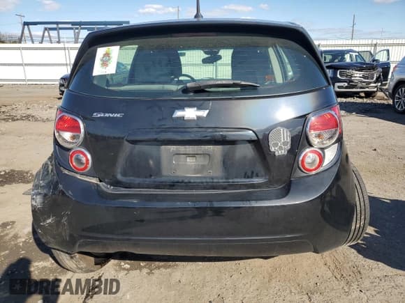 ✅ 2012 Chevrolet Sonic LS • VIN: 1G1JB6SH5C4213911 • Lot: 82407995. Listed on Copart with 214,419 mi. Free auction sales archive from the USA and detailed vehicle history report at DreamBid. Image 6.