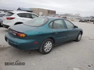 ✅ 1997 Ford Taurus G • VIN: 1FALP51U2VG299048 • Lot: 85742504. Listed on Copart with 123,356 mi. Free auction sales archive from the USA and detailed vehicle history report at DreamBid. Image 3.