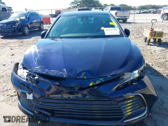 2021 Toyota Camry LE with VIN 4T1C11AK8MU461036, listed as a IAAI auction lot 43351796 with 83,856 mi miles and . Bid and sale history available at DreamBid. Image 6.