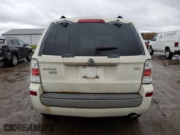 2009 Mercury Mariner Premier with VIN 4M2CU97759KJ15746, listed as a Copart auction lot 83802964 with 180,342 mi miles and Salvage title. Bid and sale history available at DreamBid. Image 6.