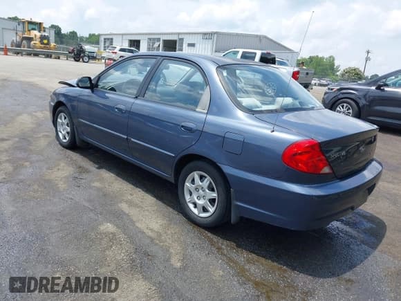 ✅ 2002 Kia Spectra • VIN: KNAFB121025143629 • Lot: 42361982. Listed on IAAI with 171,393 mi. Free auction sales archive from the USA and detailed vehicle history report at DreamBid. Image 3.