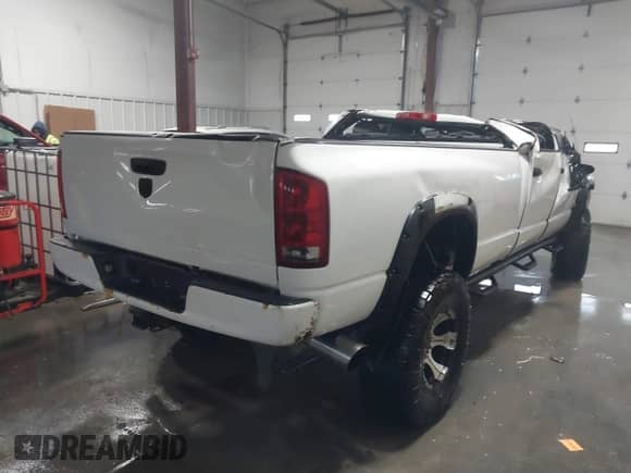 2006 Dodge 3500 SLT z VIN 3D7LX38C36G124573, wystawiony jako IAAI lot #41293879 z przebiegiem 187 850 mil mil oraz . Historia ofert i sprzedaży dostępna na DreamBid. Obrazek 4.