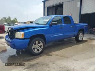 2007 Dodge Dakota ST z VIN 1D7HW28K97S270495, wystawiony jako Copart lot #67482585 z przebiegiem 185 347 mil mil oraz Szkoda całkowita • Salvage title. Historia ofert i sprzedaży dostępna na DreamBid. Obrazek 1.